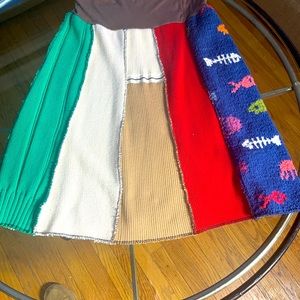 Gorgeous skirt made with pieces of vintage fabrics! One of a kind . Adorable S